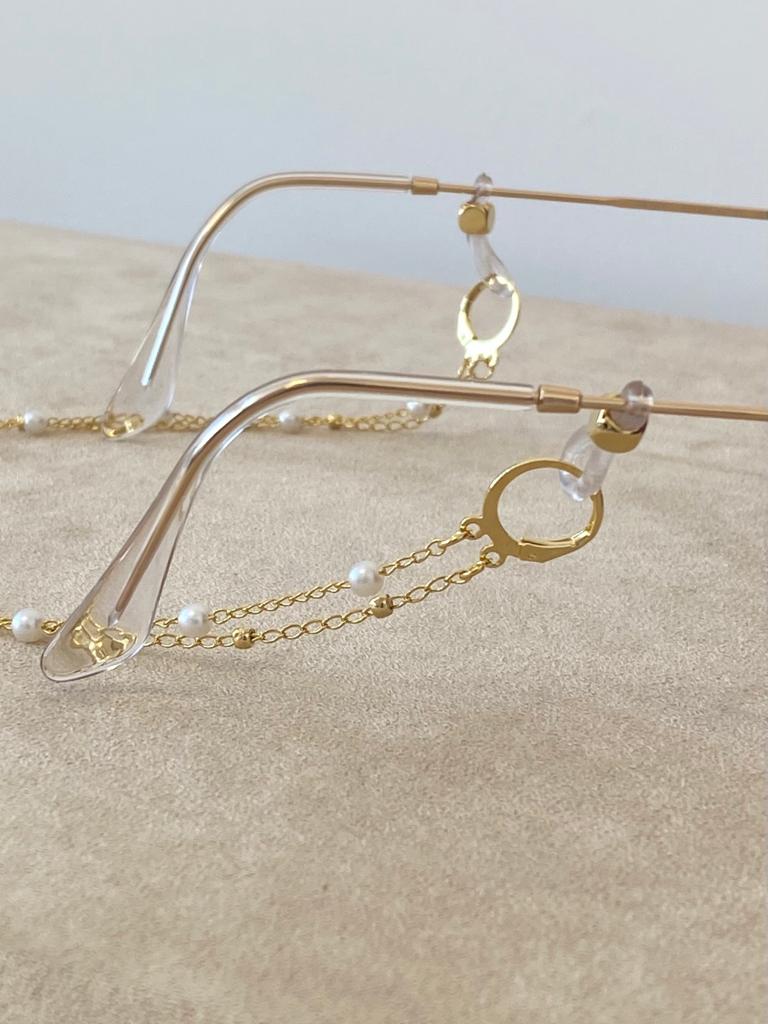 Doble bola y cadena de perlas (máscara/gafas)